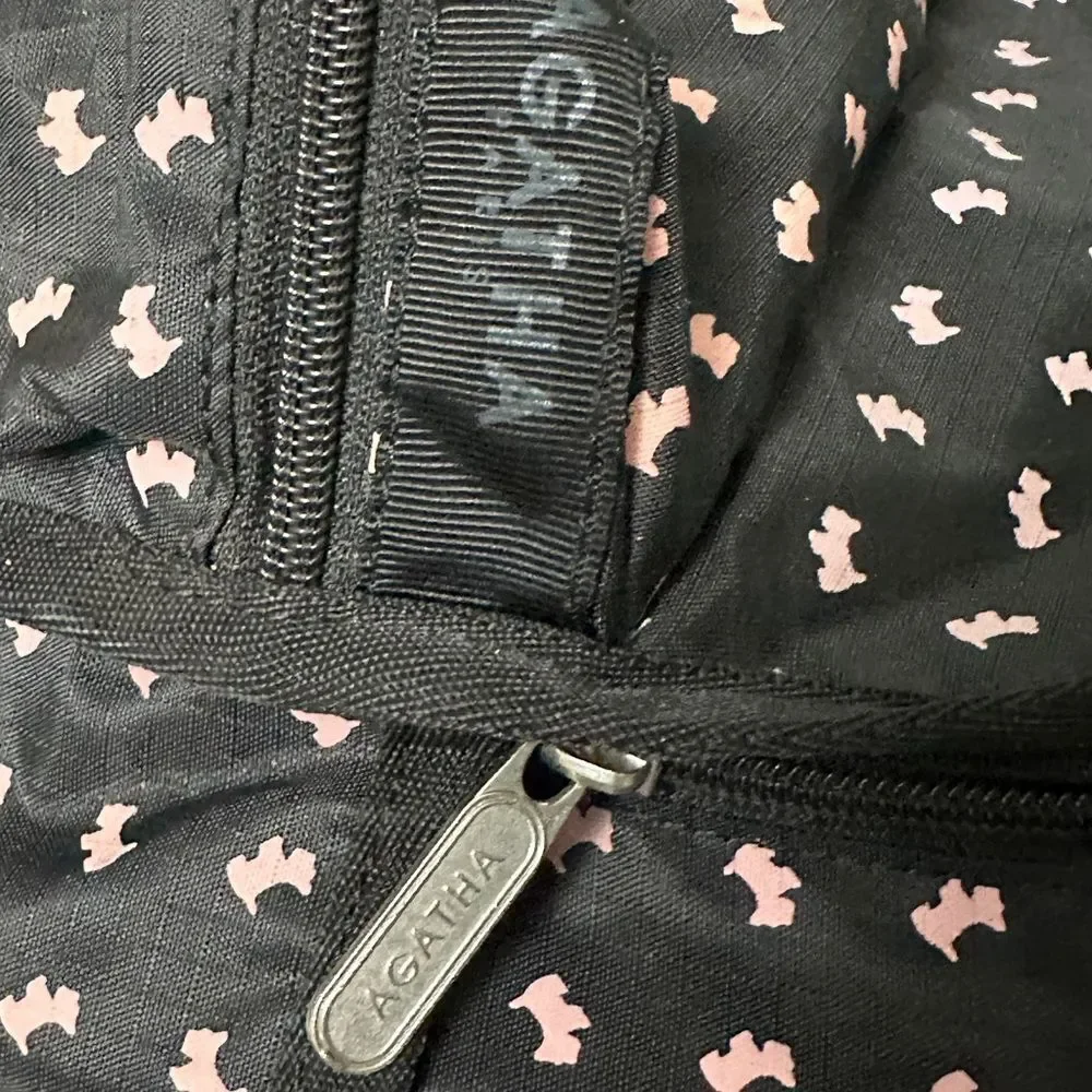 Agatha Paris Black Backpack With Pink Scottie Dog Pattern all over.